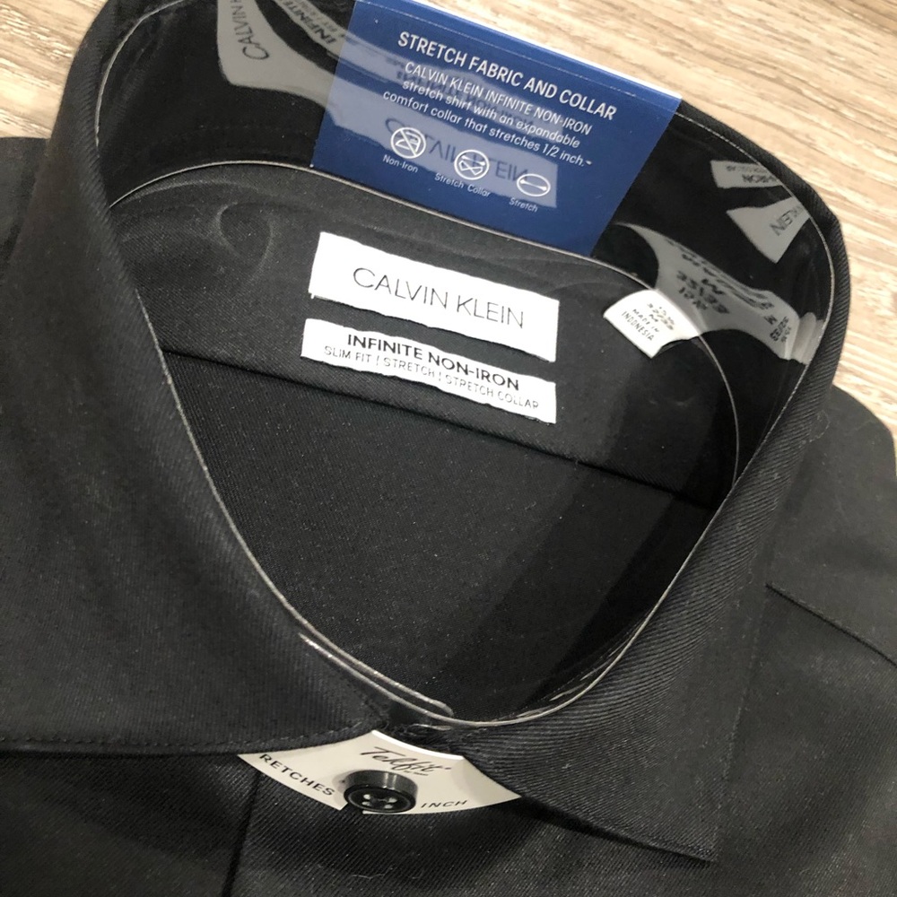BRAND NEW CALVIN KLEIN SLIM FIT DRESS SHIRT(S)!! Great men’s solid for Fall!